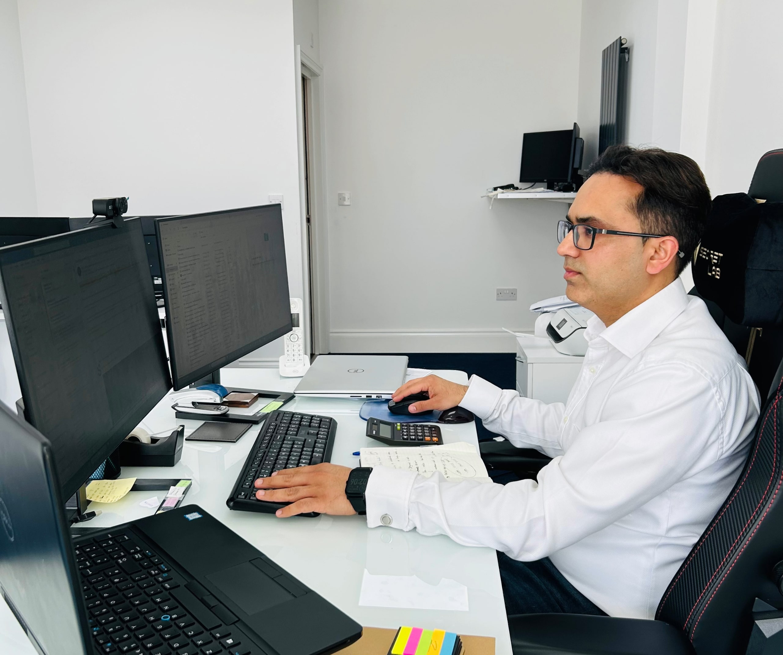 Limited company accountant working on a laptop.